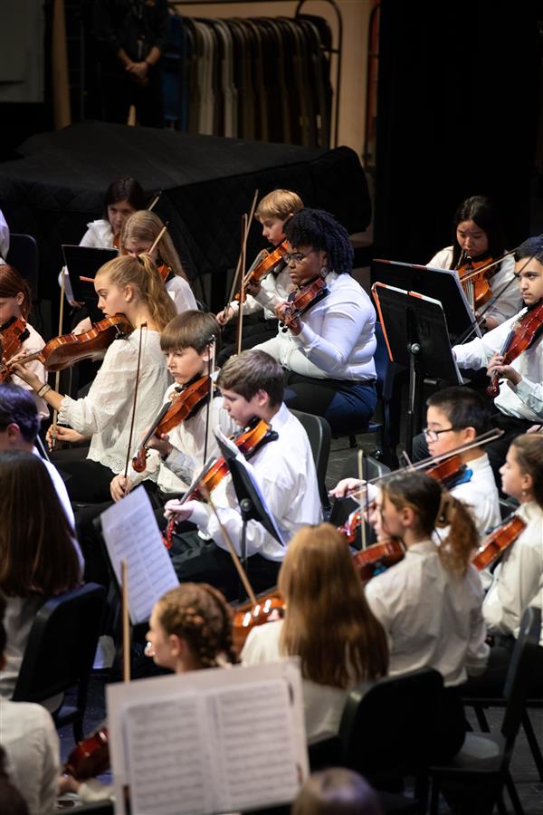 Students performing at the 2023-2024 All County Orchestra Concert
